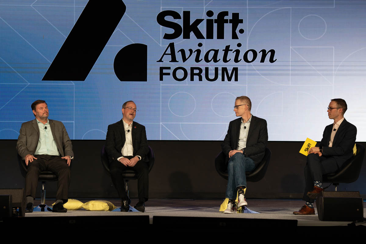 Skift Aviation Forum stage discussion on 'Network Planning in a Post-Pandemic Era' with John Kirby, Spirit Airlines VP of Network Planning, Adam Decaire, Southwest Airlines VP of Network Planning and Brian Znotins, American Airlines Vice President of Network Planning, Moderated by Edward Russell, Editor, Skift Airline Weekly
