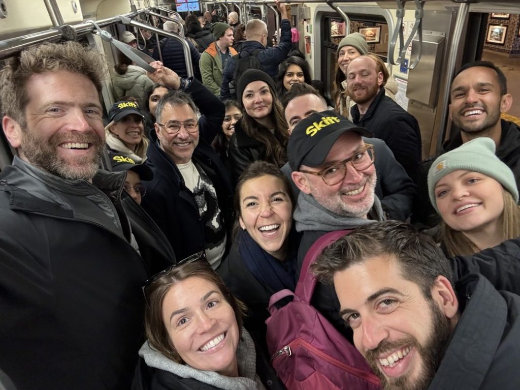 The Skift team shares a fun, energetic moment on the subway, capturing the spirit of connection and exploration.