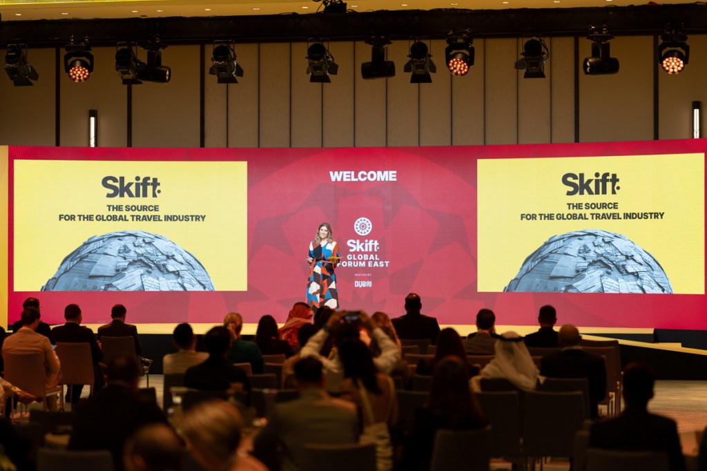 Skift Editor in Chief Sarah Kopit welcoming Skift Global Forum East attendees